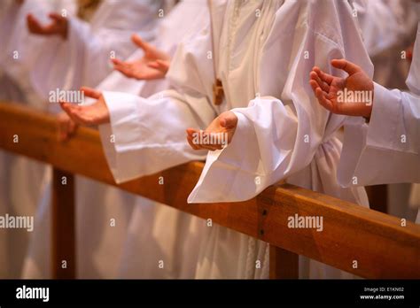 Prayer during profession of faith Stock Photo - Alamy