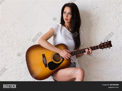 Woman Playing Guitar Image & Photo (Free Trial) | Bigstock