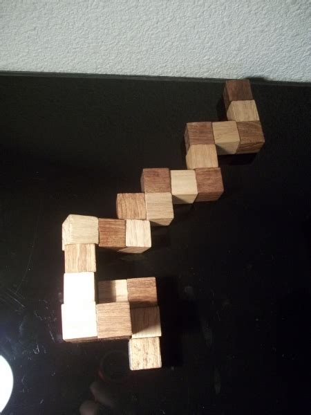 Casse-tête : le snake cube 3x3x3 en bois et sa solution – Le blog de ...