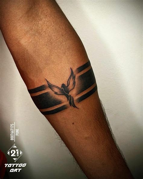 Arm band tattoo | Hand tattoos for guys, Arm band tattoo, Wrist tattoos for guys