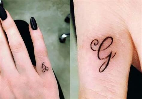 Cursive G Tattoo On Finger - Tattoo Ideas Designs Celebrity Tattoos ...