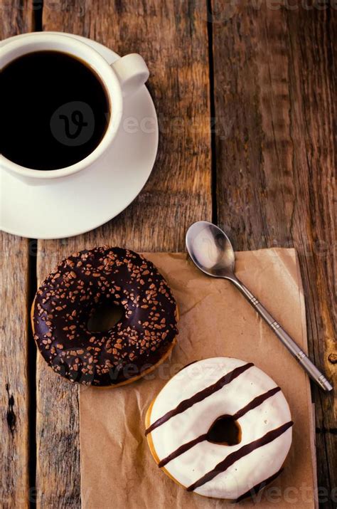 donuts and coffee 703721 Stock Photo at Vecteezy