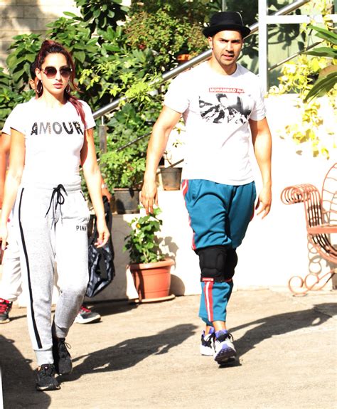 Photo Gallery: Nora Fatehi-Varun Dhawan papped outside dance studio | News | Zee News