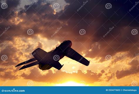 Silhouette of Jet Fighter in Cloudy Sky at Sunset Stock Image - Image ...