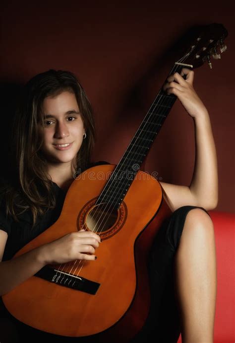 Teenage Girl Playing an Acoustic Guitar Stock Image - Image of musician, education: 71010899
