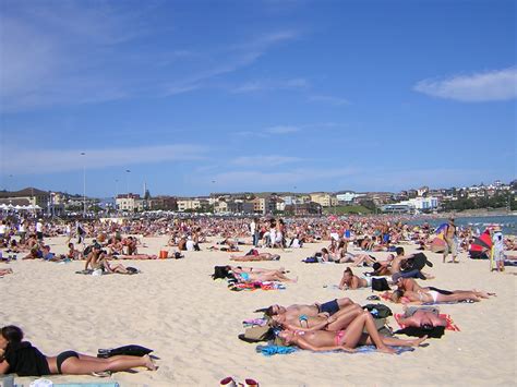 File:Sunbathing on a beach in Australia-1Jan2004.jpg