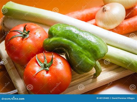 Fresh Vegetables on Cutting Board in the Kitchen Stock Image - Image of carrot, kitchen: 40139485