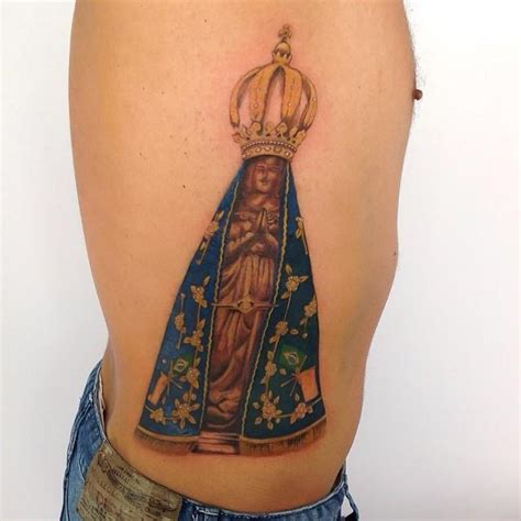 60 tatuagens de Nossa Senhora Aparecida para quem tem fé e esperança | Tattoos, Tattoo trends ...