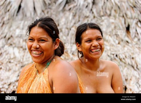 AMAZONIA, PERU - NOV 10, 2010: Unidentified Amazonian indigenous two women laugh. Indigenous ...