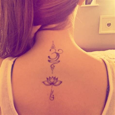 Upper back tattoo of a om and a lotus flower on Maria. | Om tattoo, Neck tattoo, Lotus flower tattoo
