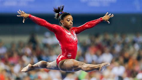 Not My Job: We Quiz Gymnast Simone Biles On The History Of The iPhone : NPR