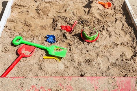 sandbox with toys on children playground 12575850 Stock Photo at Vecteezy