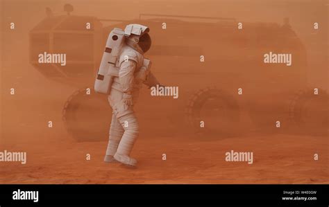 astronaut walking in martian sandstorm, mission on planet Mars Stock ...