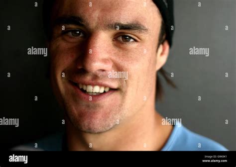 New Zealand's Dan Carter poses for a photograph following an open training session in west ...