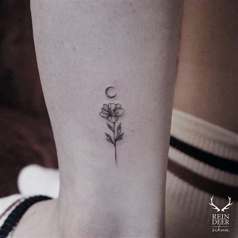 Pin by Carlee Landis on Tats | Dainty tattoos, Marigold tattoo, Tattoos