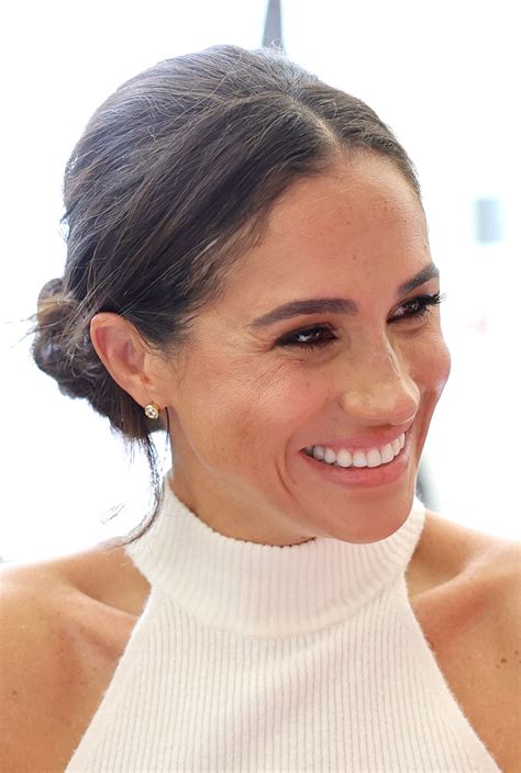 Meghan Markle's Messy Bun Is Back, Baby! — See Photos | Allure