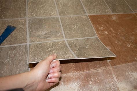 How to Remove Peel and Stick Floor Tile | Peel and stick floor, Stick on tiles, Sticky tile floor