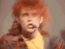 Tom Bailey Thompson Twins GIF - Tom Bailey Thompson Twins Red Roses - Discover & Share GIFs