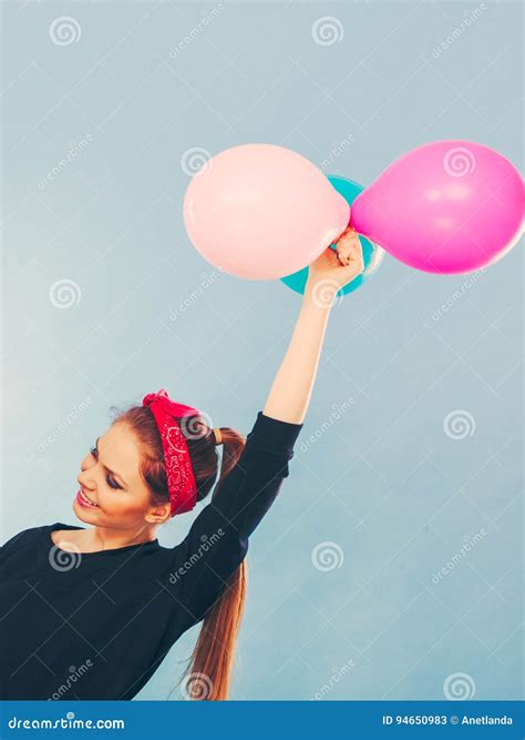 Lovely Smiling Girl Holds Colorful Balloons. Stock Image - Image of ...