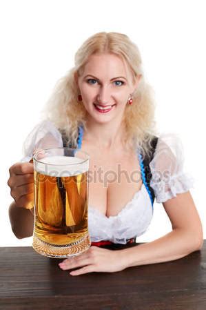 Beautiful young blond girl drinks out of oktoberfest beer stein Stock Photo by ©nazarov.dnepr ...