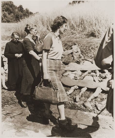 German women from Nammering are forced to walk among the corpses of ...