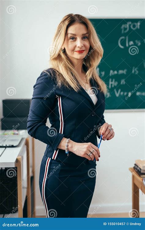 Portrait of Young Caucasian Female Teacher in School Classroom Stock ...