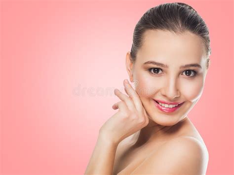 Beautiful Girl Model Brunette With Delicate Make Up On A Pink Background With A Smile Looking At ...