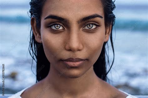 Beautiful indian woman with blue eyes Stock Photo | Adobe Stock