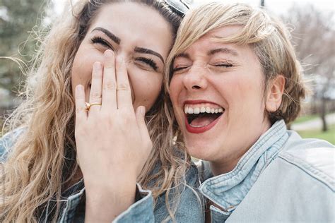 "Two Female Friends Laughing" by Stocksy Contributor "Chelsea Victoria" - Stocksy