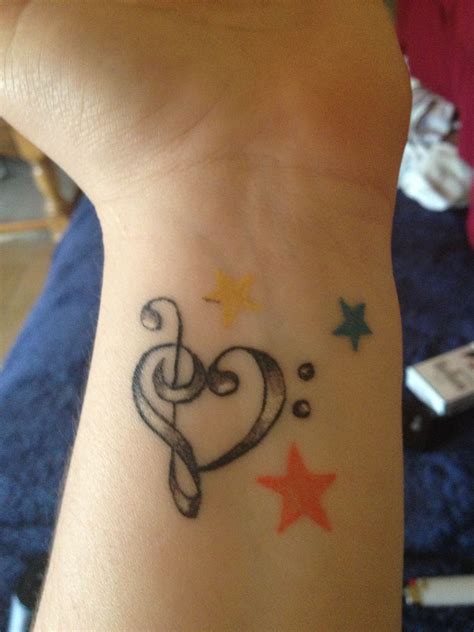 Treble clef bass clef heart tattoo!! | Tattoos, Heart tattoo, Print tattoos