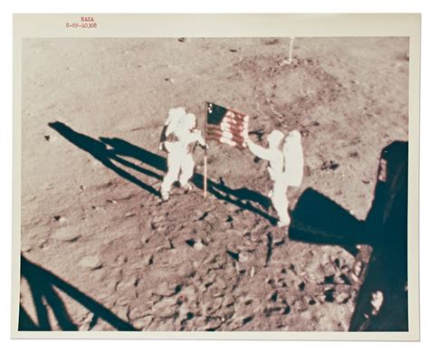 Lot Detail - Red Number NASA Photo of Neil Armstrong and Buzz Aldrin Planting the U.S. Flag on ...