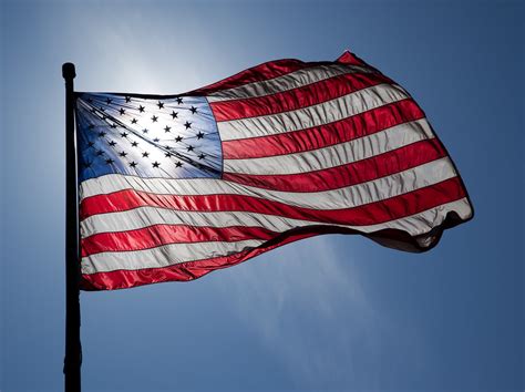 US Flag | US Flag, backlit by the sun, waves on a windy day … | Flickr