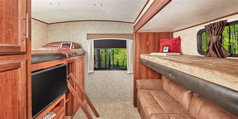 Great bunkhouse Enjoy your luxury travel trailer’s bunkroom—with optimal space for you and your ...