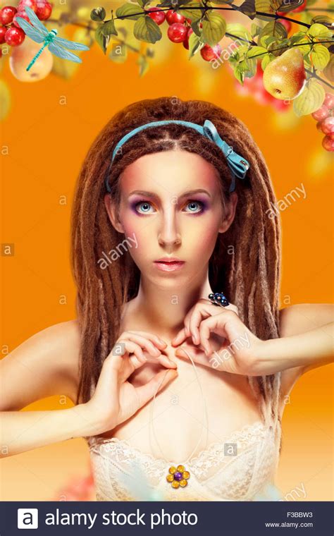 Young Woman with Dreadlocks over Colorful Background Stock Photo - Alamy