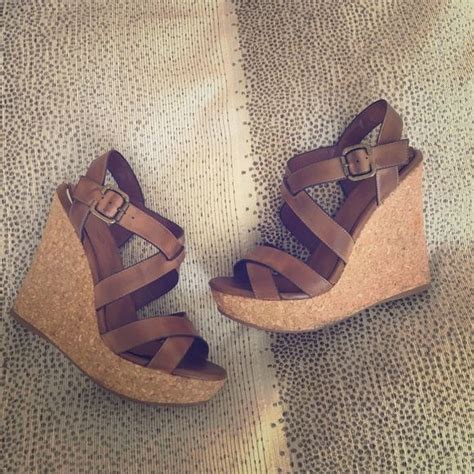 Aldo Wedge Sandals These tan sandals have been pre-loved and worn with ...