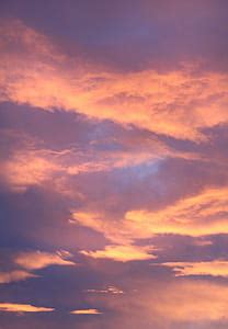 Royalty-Free photo: Silhouette of mountains under orange sky at golden hour | PickPik