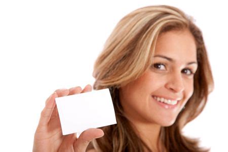 businesswoman showing her business card - isolated over a white background | Freestock photos