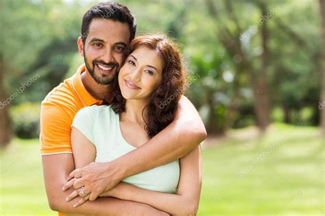 Lovely young indian couple outdoors Stock Photo by ©michaeljung 44311211