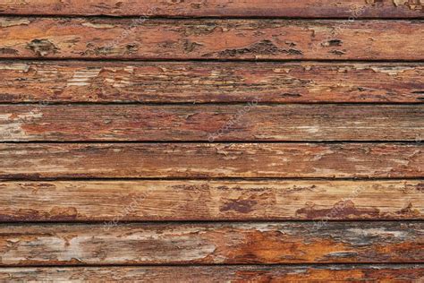 Textura de una vieja pared de madera envejecida con barniz pelado 2024