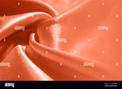 Peach Fuzz Silk Fabric with Copy Space. Color of the year 2024, Backdrop, Peach Fuzz Background ...