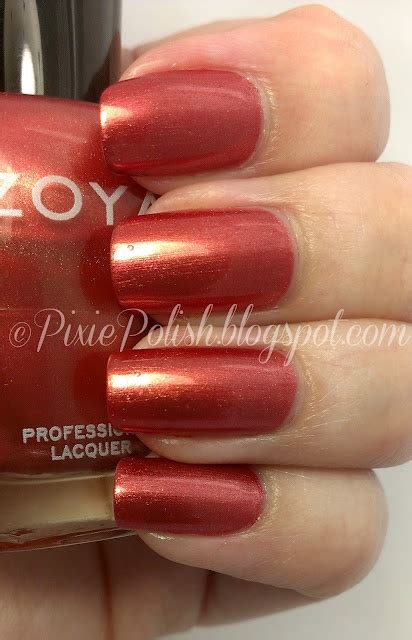Kalmia. Zoya describes this color as a "metallic red-gold fusion enhanced by copper and gold ...