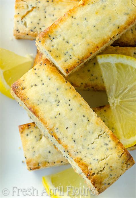 lemon and poppy seed crackers on a white plate