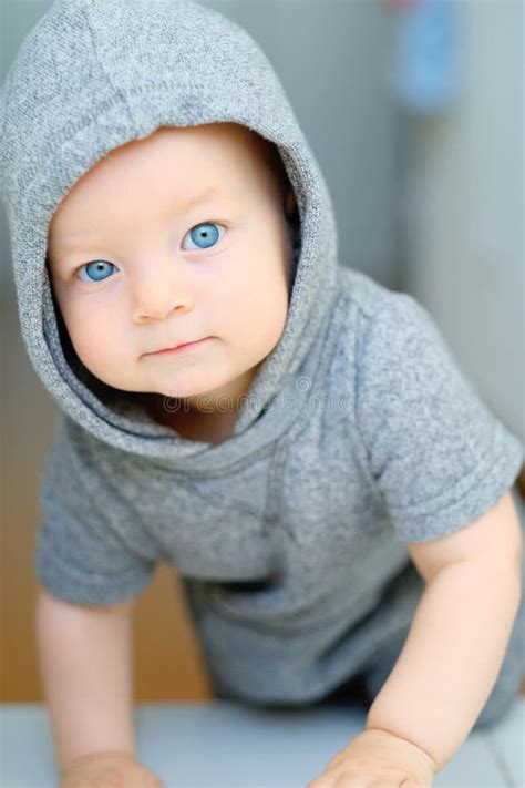 Baby boy with blue eyes stock photo. Image of happy, cheerful - 85926152