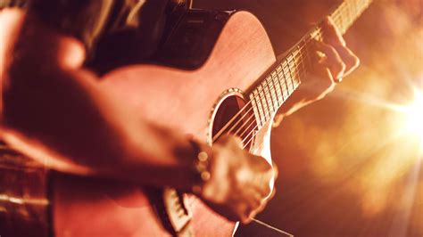 Acoustic Guitar Players : Man Playing Acoustic Guitar Stock Photo Picture And Royalty Free Image ...