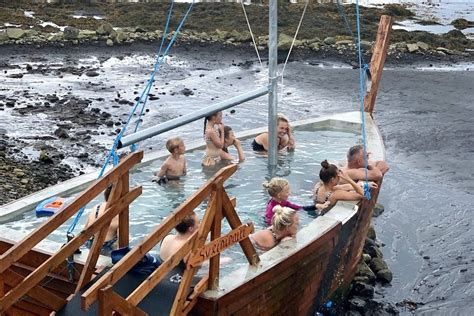 Hot tubs on the beach | Hauganes