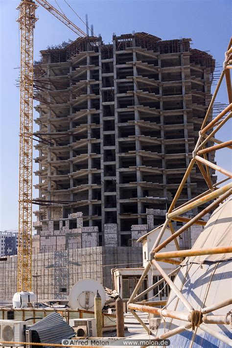 Photo of Skyscraper construction site. Qeshm city, Qeshm island, Iran - added image IR69638