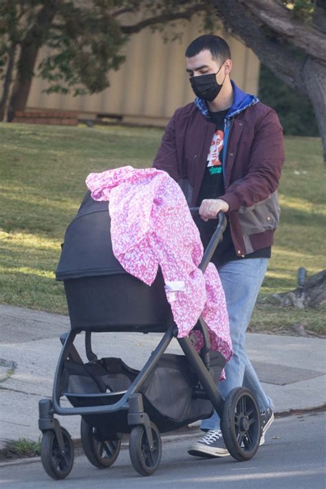 Joe Jonas Wears Classic Converse Chuck Taylors for a Post-Thanksgiving Stroll With His Baby Daughter