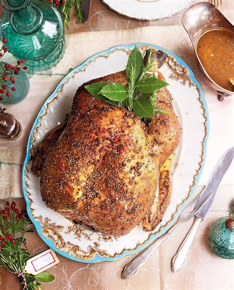 Michel Roux's simple roast turkey is spread with a mix of peppercorns before cooking and served ...