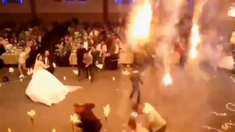 Terrifying new footage shows wedding fire that killed 100 people ripping through venue after ...