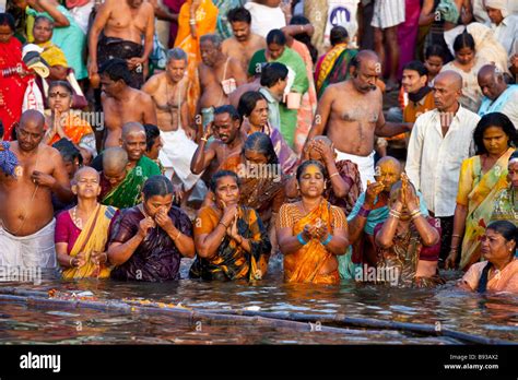 Hindu People Bathing in the Ganges River in Varanasi India Stock Photo, Royalty Free Image ...